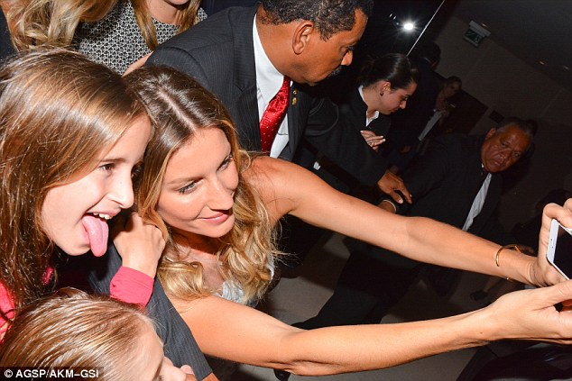 Successful: No doubt it was a thrill for followers to take photos with Gisele as she was named by Forbes as  No. 5 on the 10 most powerful businesswomen in Brazil list last year