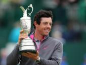 Northern Ireland's Rory McIlroy holds the Claret Jug as his poses for a photograph after winning the 2014 British Open Golf Championship at Royal Liverpool Golf Course in Hoylake, north west England on July 20, 2014. McIlroy won the British Open at Royal Liverpool Golf Course in Hoylake with a final round of 71. The 25-year-old Northern Irishman won with a seventeen under par total of 271, two strokes clear of Rickie Fowler and Sergio Garcia. AFP PHOTO / PETER MUHLYPETER MUHLY/AFP/Getty Images