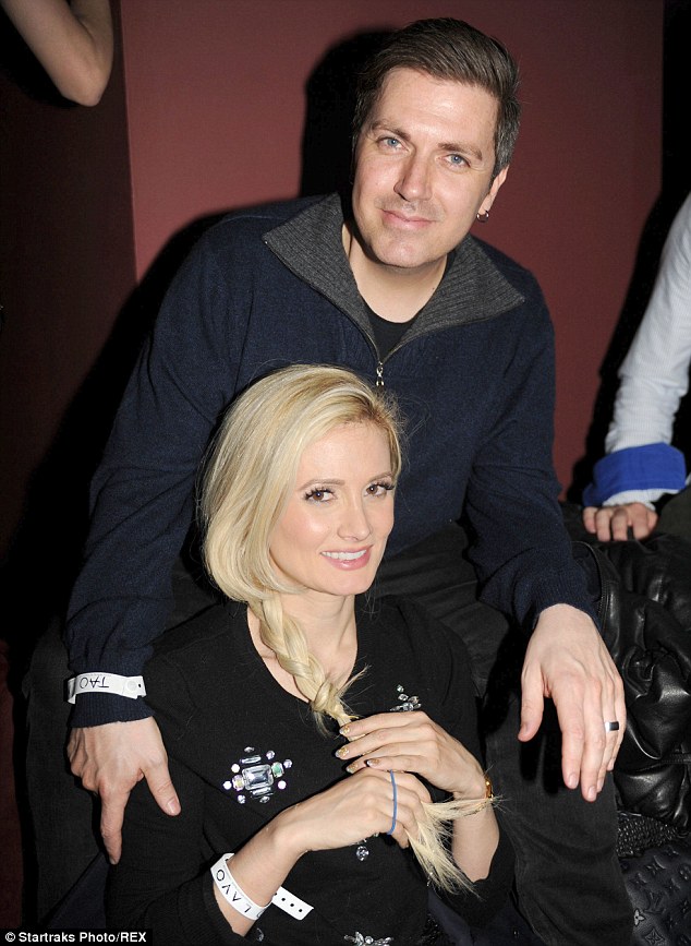 Happy family: Holly is married to event promoter Pasquale Rotella - the pair were pictured together here in January at the Sundance Film Festival, Utah