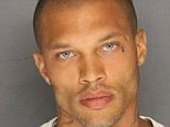 Stealing hearts: Jeremy Meeks, 30, was arrested in a gang raid by Stockton, California police on Wednesday. His arresting mugshot was subsequently posted to the police department's Facebook page and in fewer than 24 hours gained over 20,000 likes and received nearly six thousand comments and counting