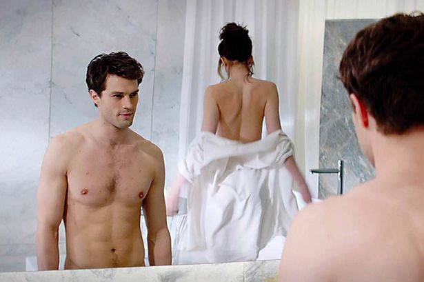 Dakota Johnson and Jamie Dornan in Fifty Shades of Grey