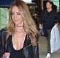 EXCLUSIVE - Jennifer Hawkins  Jake Wall at Sydney Airport, believed to be headed to Melbourne for the Logies. May 7, 2016