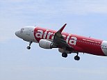 In this May 9, 2014 photo, an Air Asia A320-200 plane takes off from Kuala Lumpur International Airport 2 in Sepang, Malaysia. An AirAsia plane with 161 people on board lost contact with ground control on Sunday, Dec. 28, 2014,  while flying over the Java Sea after taking off from a provincial city in Indonesia for Singapore, and search and rescue operations were underway.  AirAsia, a regional low-cost carrier with presence in several Southeast Asian countries, said in a statement that the missing plane was an Airbus A320-200 and that search and rescue operations were in progress. The plane in this photo is the same model but not the one which went missing in Indonesia Sunday.  (AP Photo/Joshua Paul)