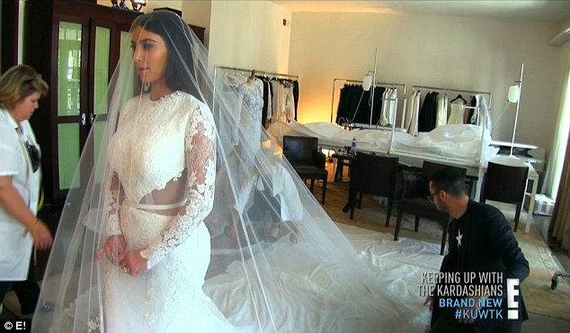 Nice day for a white wedding: Kim showed off her Givenchy gown at a fitting in New York City