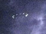 Several people in Houston took pictures of what appears to be a bright, oval object hovering in the skies