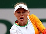 True colours: Caroline Wozniacki wore white, orange and green, the colours of the Irish flag in her French Open defeat to Yanina Wickmayer