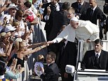 Pope Francis has told his security officials he wants to be able to interact with crowds when he is out in public and cannot do so effectively behind a screen of bullet proof glass