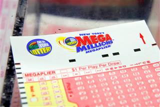 Image: A ticket is seen ahead of the Mega Millions lottery draw which reached a jackpot of $415 Million in Manhattan, New York, U.S.