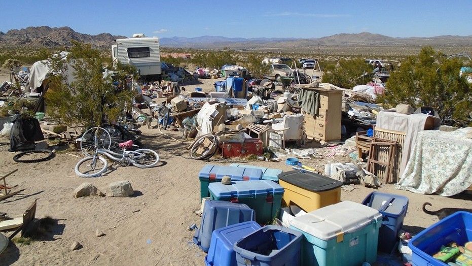 California law enforcement officials arrested two parents in Joshua Tree after discovering they lived with their three children in a plywood box.