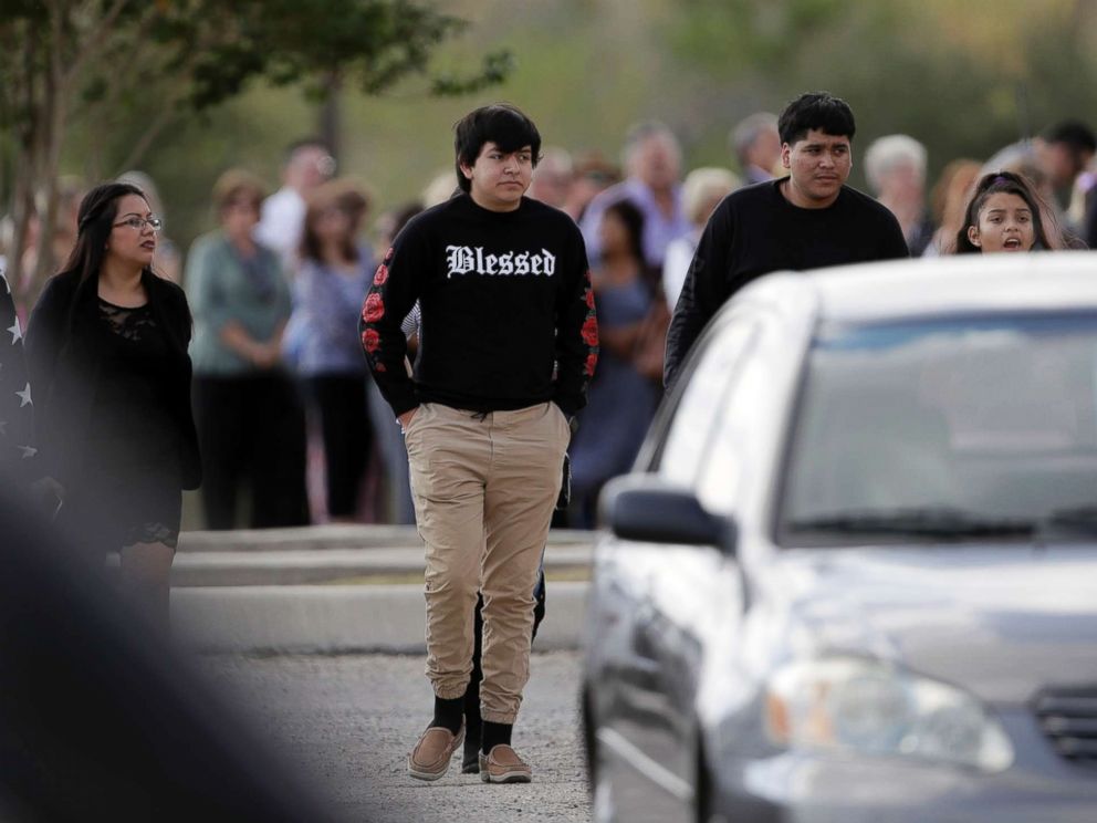 PHOTO: Mourners arrive at the Floresville Event Center to attend a funeral for members of the Holcombe family who were killed in the Sutherland Springs Baptist Church shooting, Nov. 15, 2017, in Floresville, Texas.