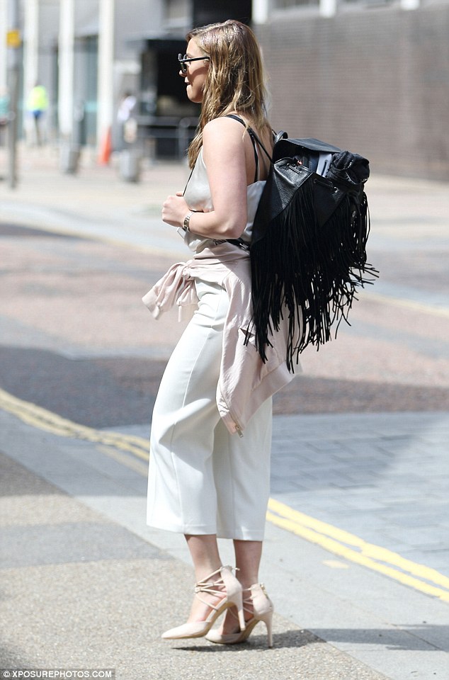 Adventure time: Ready for all eventualities, the TOWIE star also toted a black fringed rucksack