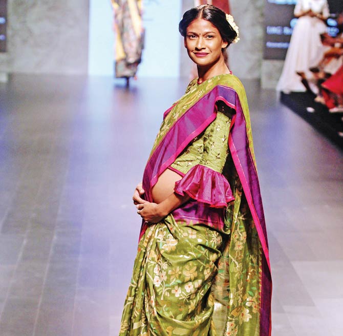 Carol Gracias was the cynosure on the ramp with her baby bump