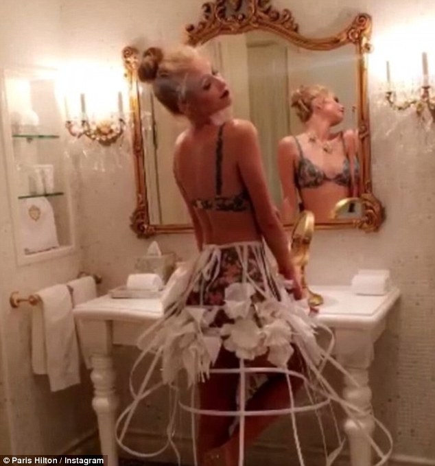 Behind the scenes: She's never been shy of flaunting her figure, and Paris Hilton treated her 5.7million Instagram followers to another sultry offering as she stripped off to her lingerie in a sizzling video