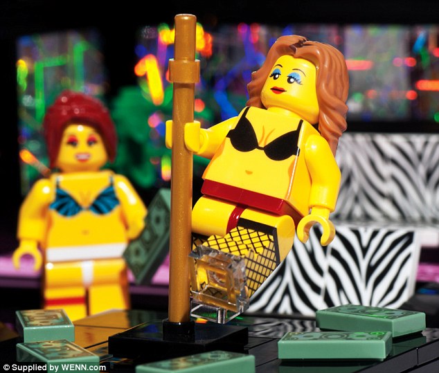 Cheeky: The set comes with two customized Lego strippers in bikini tops and G-strings 