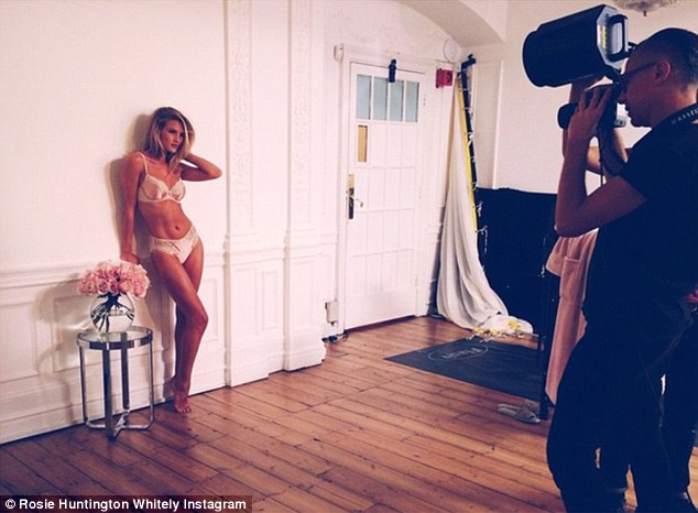 Sneak peak: Rosie Huntington-Whiteley shared a behind-the-scenes shot of her latest Rosie For Autograph lingerie photo shoot for MS on Monday 