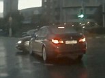 Video footage of a Russian 'ghost car' has left viewers scratching their heads after apparently showing a vehicle appearing out of nowhere at a busy intersection