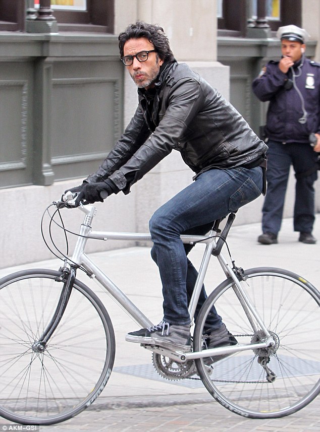 Getting some exercise: Meanwhile in New York Carlos Leon, father of Lourdes, rode a bicycle around Soho