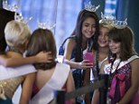 A Florida mother fed her daughter tapeworms so she could lose weight for a beauty pageant; pictured are contestants from Miss America Nevada