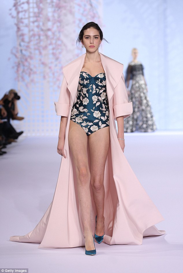 Hit collection: The beautiful show also included lingerie-style outfits, complete with applique flowers