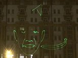 Russian students create laser show of Barack Obama eating a banana