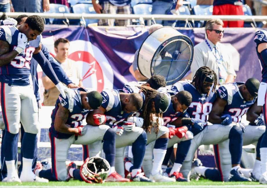 Some members of the Oakland Raiders kneel during the playing of the National Anthem before an NFL football game against the Washington Redskins in Landover, Md., Sunday, Sept. 24, 2017. (AP Photo/Alex Brandon) Photo: Alex Brandon, Associated Press