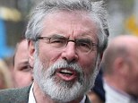 Sinn Fein leader Gerry Adams was arrested last night by police for the murder of a widowed mother of ten