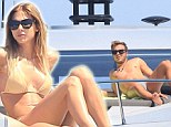 Sunny: Mario Gotze relaxes on boat in Ibiza with lingerie model girlfriend