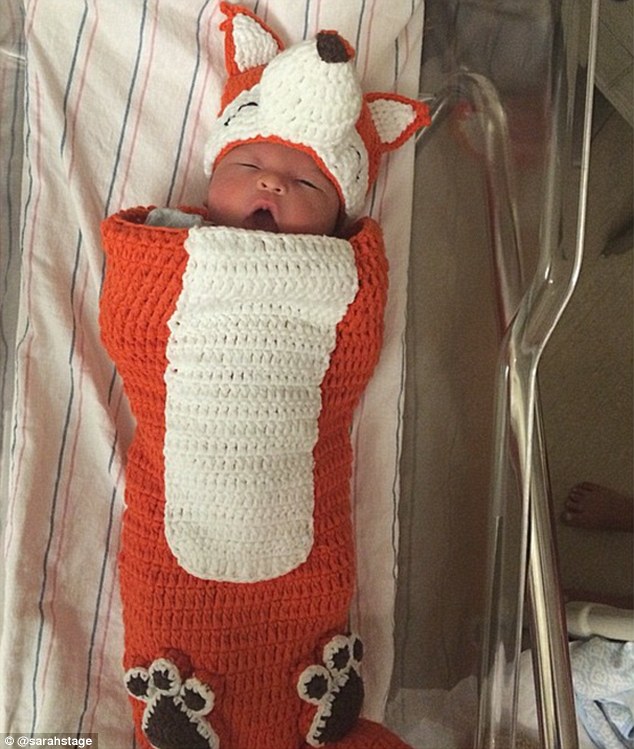 Underwear model and animal rights activist Sarah Stage shared this adorable picture of her newborn baby James Hunter on Instagram 