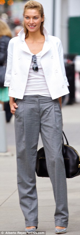 Say cheese! Jessica Hart posed for the cameras on the street in New York as she attended New York Fashion Week