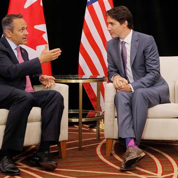 Image: Canadian Prime Minister Justin Trudeau and Kentucky Governor Matt Bevin talk