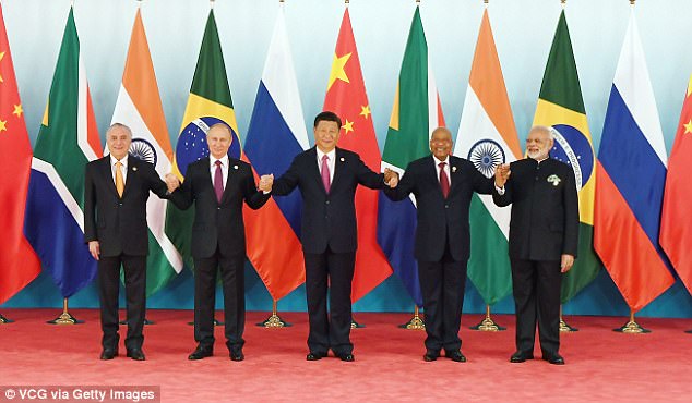 (L-R) Brazil's President Michel Temer, Russian President Vladimir Putin, Chinese President Xi Jinping, South Africa's President Jacob Zuma and Indian Prime Minister Narendra Modi pose during the BRICS Summit at Xiamen International Conference and Exhibition Centre