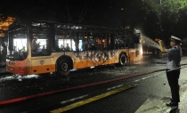 China Police Officer at the Scene of a Bus Crash