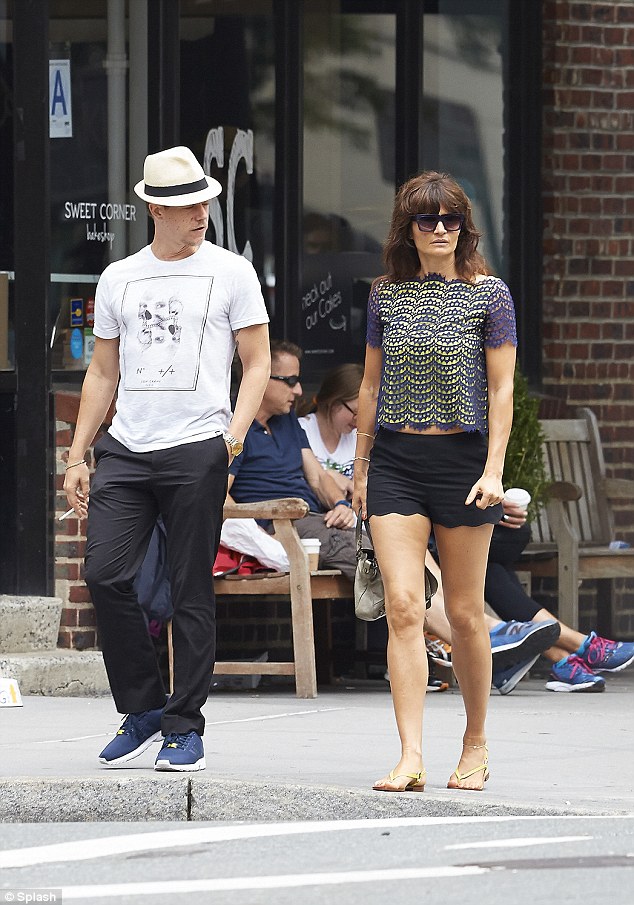 Model behaviour: Helena Christensen wears a pair of short shorts while out for a walk with her boyfriend Paul Banks in the West Village neighborhood of NYC