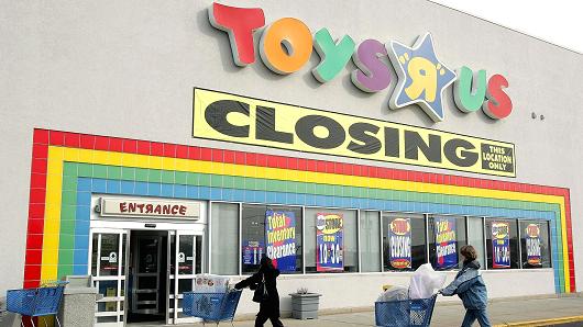 'Store Closing' sign is posted in a Toys R Us store.