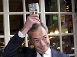 Nigel Farage sinks a pint outside the Westminster Arms, just a short walk from the Houses of Parliament