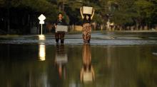 IMAGES: The Latest: Death toll from Harvey reaches at least 60