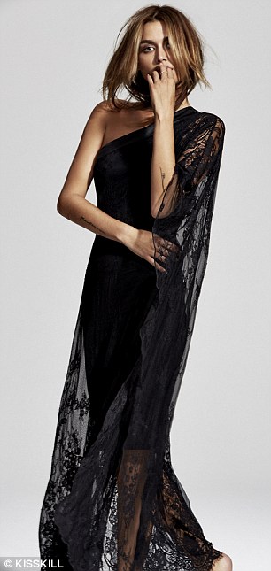 Posing up a storm: The Face star looked every inch a supermodel in this flowing lace nightgown