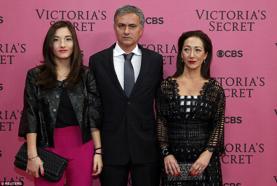 Mourinho looked sharp in his suit and tie as he was flanked by his wife and daughter upon his arrival at the show