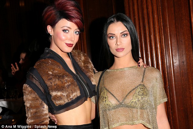 Fashion pals: Cally posed with singer, Hatty Keane at the event, who showed off her extremely toned torso in a cropped fur jacket