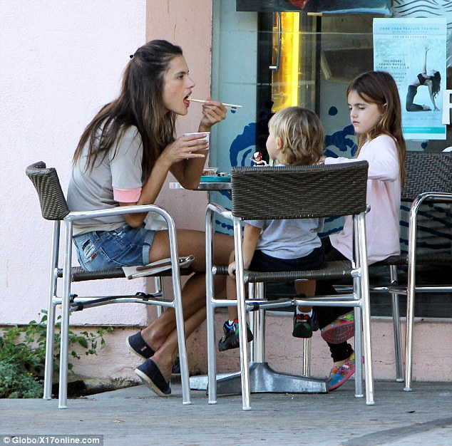 Bit peckish? The trio looked to have worked up an appetite during their day of shopping though, as the Brazilian beauty was seen treating her two children to a sushi lunch after their spending