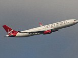 Cabin crew were forced to intervene after a drunken British woman had sex with another passenger on board a Virgin Atlantic flight