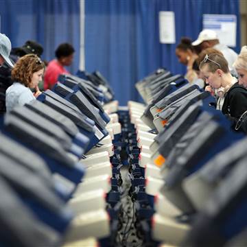 Image: Voters cast ballots for the presidential election at an early voting site in Chicago