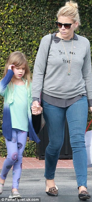 Mother-daughter date: The former Dawson's Creek star's little girl looked cute wearing a donut-print leggings, teal shirt and tie-dye cardigan