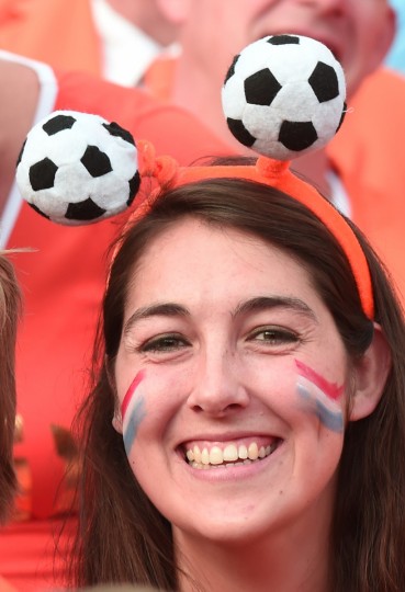 A Netherland's fan prepares to support her team before the international friendly football match Netherlands against Ghana at the Kuip Stadium in Rotterdam. (Damien Meyer/AFP/Getty Images)