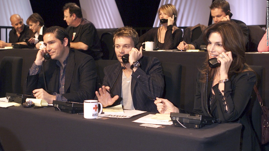 Jim Caviezel, left, Ryan Seacrest and Crawford take calls during the quot;Tsunami Aid: A Concert of Hopequot; telethon in 2005. 