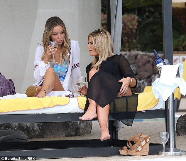 Letting their hair down: Lauren Pope and Danielle Armstrong may have been working, but they appeared completely relaxed