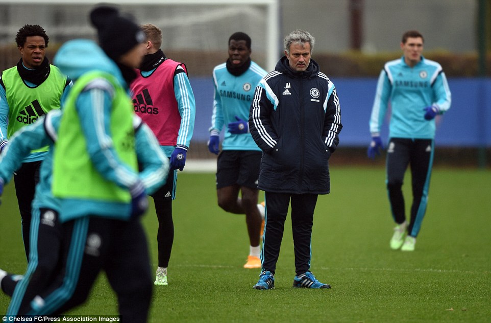 Mourinho oversees a Chelsea training session on Tuesday morning ahead of the fashion show in the evening