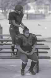 READY TO ROCKmdash;Ventura County Wolfpack football players Maria Torres, top, and Faye Langford boost the 25-player roster. 