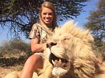 family pride: Jones first learned to love the hunt when she started following her father to Africa for his own hunts at age 9