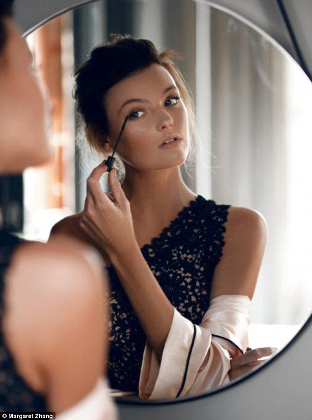 Mirror, mirror: Montana looked Audrey Hepburn-esque as she poses with a mascara wand in one hand